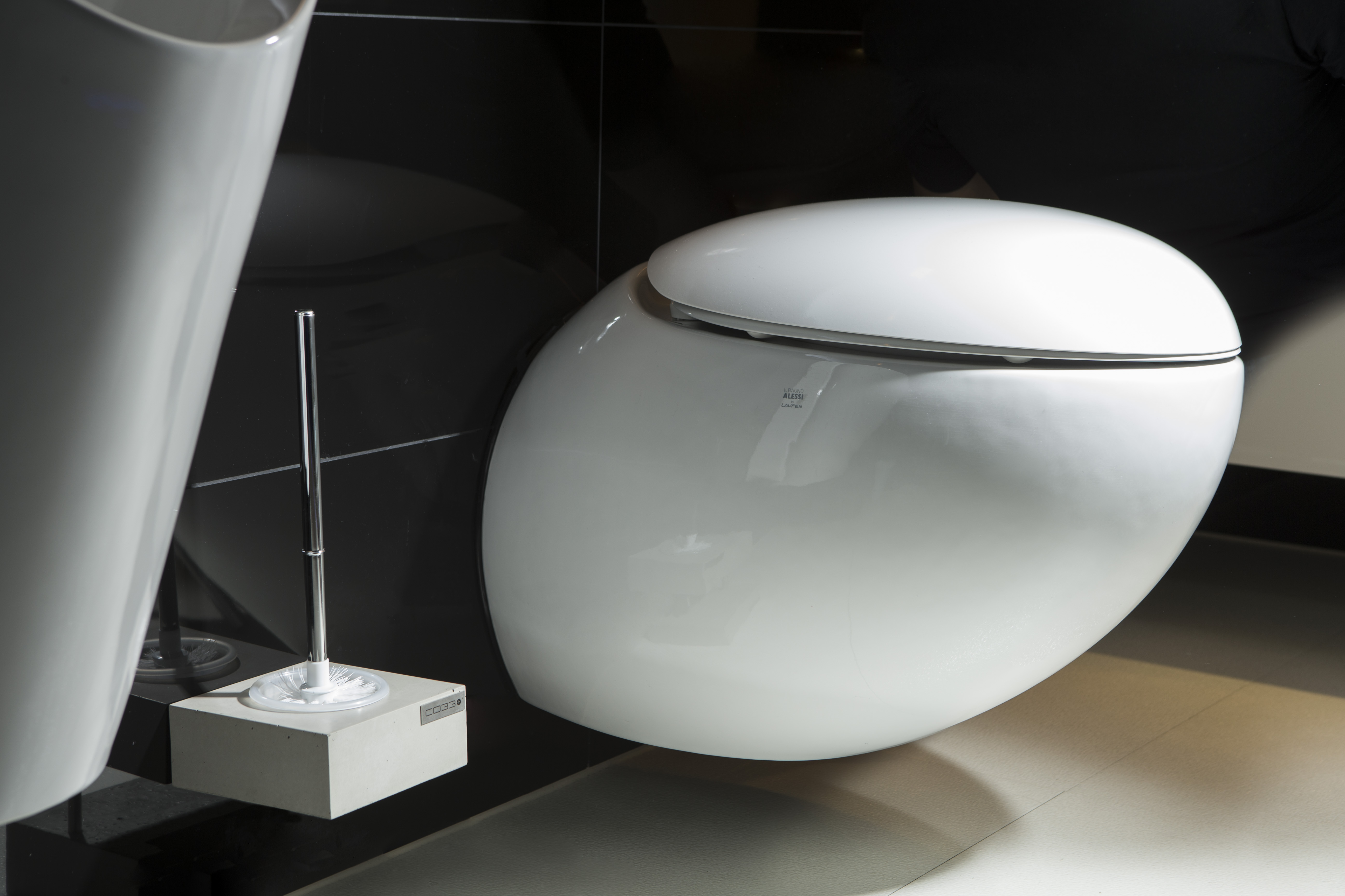 Modern Toilet Brush Holder made of concrete with PVC insert and white brush in Bauhaus Design